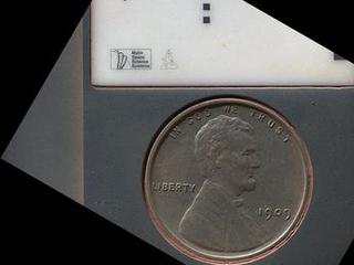The penny in this image is part of a camera calibration target on NASA's Mars rover Curiosity.
