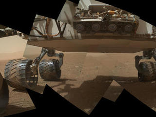 This view of the lower front and underbelly areas of NASA's Mars rover Curiosity combines nine images taken by the rover's  Mars Hand Lens Imager (MAHLI) during the 34th Martian day, or sol, of Curiosity's work on Mars (Sept. 9, 2012).