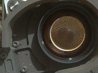 This image from NASA's Curiosity rover shows the open inlet where powdered rock and soil samples will be funneled down for analysis.
