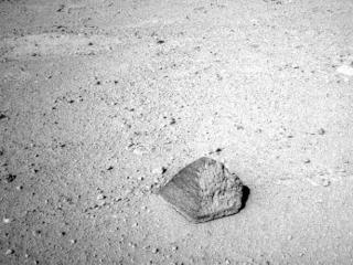 The drive by NASA's Mars rover Curiosity during the mission's 43rd Martian day, or sol, (Sept. 19, 2012) ended with this rock about 8 feet (2.5 meters) in front of the rover.