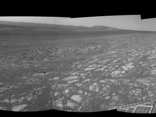 On the horizon in the right half of this panoramic view is an area of Mars informally named "Matijevic Hill," in commemoration of an influential rover-team leader.