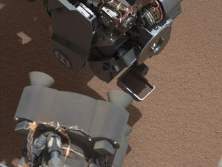 This image from the right Mast Camera (Mastcam) of NASA's Mars rover Curiosity shows a scoop full of sand and dust lifted by the rover's first use of the scoop on its robotic arm.