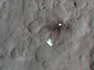 This 3D, or stereo anaglyph, view shows the parachute and back shell that helped guide NASA's Curiosity to the surface of Mars.