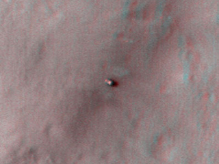 This 3D, or stereo anaglyph, view shows NASA's Mars rover Curiosity where it landed on Mars within Gale Crater, at a site now called Bradbury Landing.
