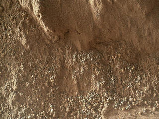 This image shows the wall of a scuffmark NASA's Curiosity made in a windblown ripple of Martian sand with its wheel.