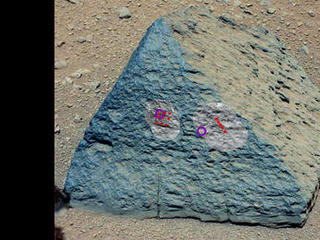 This image shows where NASA's Curiosity rover aimed two different instruments to study a pyramid-shaped rock known as "Jake Matijevic."