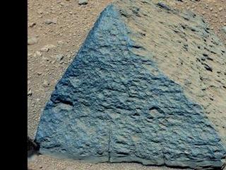 This image shows where NASA's Curiosity rover aimed two different instruments to study a pyramid-shaped rock known as "Jake Matijevic."