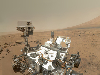 On Sol 84 (Oct. 31, 2012), NASA's Curiosity rover used the Mars Hand Lens Imager (MAHLI) to capture this set of 55 high-resolution images, which were stitched together to create this full-color self-portrait.