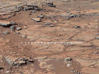 The right Mast Camera (Mastcam) of NASA's Curiosity Mars rover provided this contextual view of the vicinity of the location called "John Klein," selected as Curiosity's first drilling site.