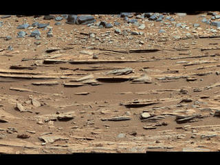 The "Shaler" outcrop is dramatically layered, as seen in this mosaic of telephoto images from the right Mast Camera (Mastcam) on NASA's Mars rover Curiosity.