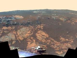 As NASA's Mars Exploration Rover Opportunity neared the ninth anniversary of its landing on Mars, the rover was working in the 'Matijevic Hill' area seen in this view from Opportunity's panoramic camera (Pancam).