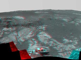As NASA's Mars Exploration Rover Opportunity neared the ninth anniversary of its landing on Mars, the rover was working in the 'Matijevic Hill' area seen in this stereo view from Opportunity's panoramic camera (Pancam).