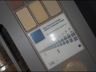 This image of a calibration target illuminated by white-light LEDs (light emitting diodes) is part of the first set of nighttime images taken by the Mars Hand Lens Imager (MAHLI) camera at the end of the robotic arm of NASA's Mars rover Curiosity.
