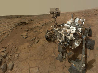 This rectangular version of a self-portrait of NASA's Mars rover Curiosity  combines dozens of exposures taken by the rover's Mars Hand Lens Imager (MAHLI) during the 177th Martian day, or sol, of Curiosity's work on Mars (Feb. 3, 2013).