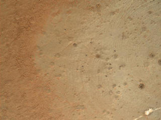 This image from the Mars Hand Lens Imager (MAHLI) on NASA's Mars rover Curiosity shows details of rock texture and color in an area where the rover's Dust Removal Tool (DRT) brushed away dust that was on the rock.