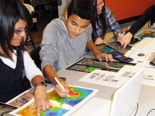 Ninth-grade, high-school students from Peoria, AZ analyze images of Mars.