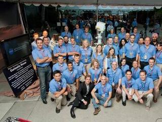 Engineers at NASA's Jet Propulsion Laboratory in Pasadena, Calif., celebrate the landing of NASA's Curiosity rover on the Red Planet.
