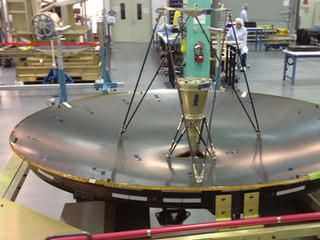 The MAVEN high-gain antenna measures 6.5 feet (79 inches) in diameter by 3.3 feet (40 inches) tall. The reflector is made of Kevlar honeycomb core sandwiched between two composite face sheets. It is currently undergoing performance, pattern, and acoustic testing at Lockheed Martin's facility in Newtown, Pa.
