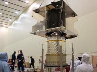 The MAVEN spacecraft core structure is successfully lowered and mated to the hydrazine propulsion tank and boat tail assembly at Lockheed Martin, Denver.