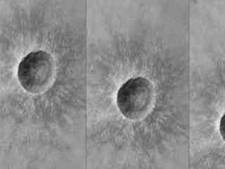 This black-and-white image shows a large crater and small crater on the surface of Mars in three views, in which the craters are in slightly different positions relative to the middle of each of the three frames. It simulates what the camera might see as it moved horizontally through the atmosphere during descent.  A sunflower-petal-like blanket of ejected rocks and soil surround the dark hole of the bright rimmed crater.
