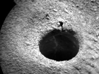 NASA's Curiosity Mars rover targeted the laser of the Chemistry and Camera (ChemCam) instrument with remarkable accuracy for assessing the composition of the wall of a drilled hole and tailings that resulted from the drilling.
