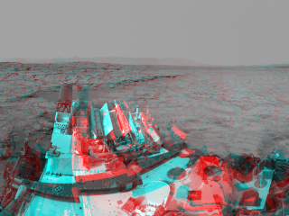 Left and right eyes of the Navigation Camera (Navcam) in NASA's Curiosity Mars rover took the dozens of images combined into this stereo scene of the rover and its surroundings.