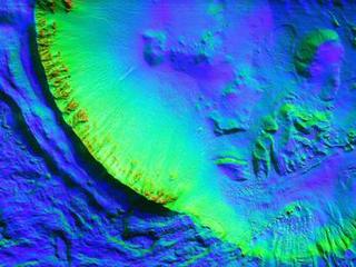 This unnamed impact crater is about 8 kilometers in diameter and contains numerous gullies.