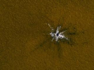 This crater, formed in 2008, exposes shallow, clean ice that is not uncommon in the middle-to-high latitudes on Mars.
