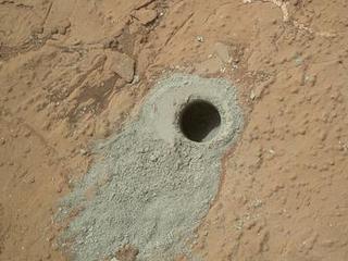 NASA's Mars rover Curiosity drilled into this rock target, "Cumberland," during the 279th Martian day, or sol, of the rover's work on Mars (May 19, 2013) and collected a powdered sample of material from the rock's interior.