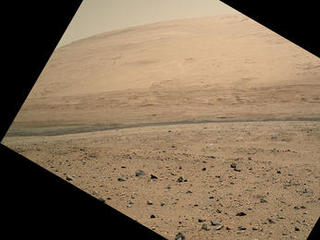 The Mars Hand Lens Imager (MAHLI) camera on NASA's Curiosity rover is carried at an angle when the rover's arm is stowed for driving.