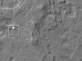 NASA's Curiosity rover and its parachute were spotted by NASA's Mars Reconnaissance Orbiter as Curiosity descended to the surface on Aug. 5 PDT (Aug. 6 EDT).
