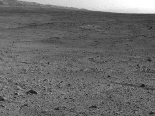 NASA's Mars rover Curiosity captured this view using its Navigation Camera (Navcam) after reaching the top of a rise called "Panorama Point" with a drive during the 388th Martian day, or sol, of the rover's work on Mars (Sept. 8, 2013).