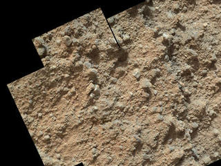 This mosaic of nine images, taken by the Mars Hand Lens Imager (MAHLI) camera on NASA's Mars rover Curiosity, shows detailed texture in a conglomerate rock bearing small pebbles and sand-size particles.