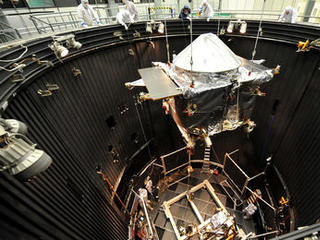 The MAVEN spacecraft is moved into the Thermal Vacuum Chamber (TVAC) at Lockheed Martin on May 16, 2013.