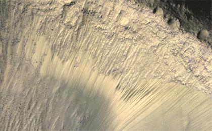 These images from the High Resolution Imaging Science Experiment (HiRISE) camera on NASA's Mars Reconnaissance Orbiter show how the appearance of dark markings on Martian slope changes with the seasons.