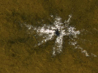 This image taken on May 19, 2010, shows an impact crater that had not existed when the same location on Mars was previously observed in March 2008.