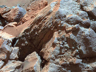 A portion of an exposure of bedrock dubbed "Larry's Outcrop" shows little layering in this view, in contrast to nearby outcrops called "Methuselah" and "Jibsheet."