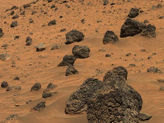 Spirit drove through the basin south of "Husband Hill," mainly driving over sand and dune deposits until it came across this spectacular example of basaltic rocks called "Lorre Ridge."