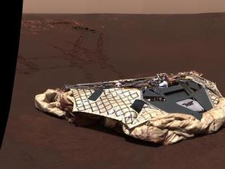 This image taken by the panoramic camera onboard Opportunity shows the rover's now-empty lander, the Challenger Memorial Station, at Meridiani Planum, Mars.