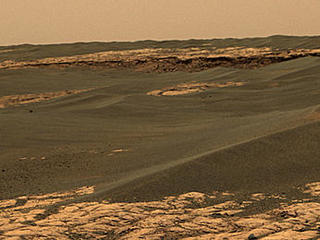 This image shows a portion of the rim of "Erebus Crater" in the Meridiani Planum region of Mars.