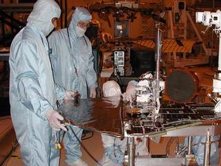 Engineers for NASA's Mars Exploration Rover Mission are completing assembly and testing for the twin robotic geologists at JPL. This
