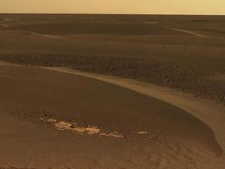 As Opportunity continued to traverse from "Erebus Crater" toward "Victoria Crater," the rover navigated along exposures of bedrock between large, wind-blown ripples.