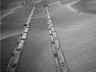 Opportunity used its navigation camera for this northward view of tracks the rover left on a drive from one energy-favorable position on a sand ripple to another.