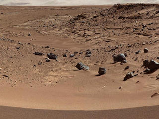 This view combines several frames taken by the Mast Camera (Mastcam) on NASA's Mars rover Curiosity, looking into a valley to the west from the eastern side of a dune at the eastern end of the valley.