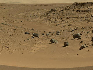 This view combines several frames taken by the Mast Camera (Mastcam) on NASA's Mars rover Curiosity, looking into a valley to the west from the eastern side of a dune at the eastern end of the valley.