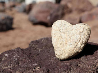 This heart-shaped granite rock was spotted in JPL's Mars Yard just in time for Valentine's Day.  Engineers were driving the Earth-bound copy of the Curiosity rover, informally named Maggie, for tests that day.