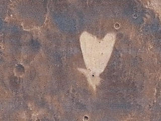 This picture of a heart-shaped feature in Arabia Terra was taken on 23 May 2010 by the CTX camera on the MRO spacecraft.