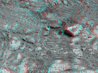 This image from the panoramic camera (Pancam) on NASA's Mars Exploration Rover Opportunity shows where a rock called "Pinnacle Island" had been before it appeared in front of the rover in early January 2014.