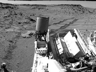 This panorama combining images taken on Feb. 10, 2014, by the Navigation Camera (Navcam) on NASA's Curiosity Mars rover looks back to where the rover crossed a dune at "Dingo Gap" four days earlier. The view is centered toward the east and spans about 225 degrees.