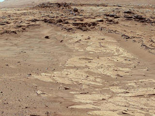 Sandstone layers with varying resistance to erosion are evident in this Martian scene recorded by the Mast Camera on NASA's Curiosity Mars rover on Feb. 25, 2004, about one-quarter mile (about 400 meters) from a planned waypoint called "the Kimberley."